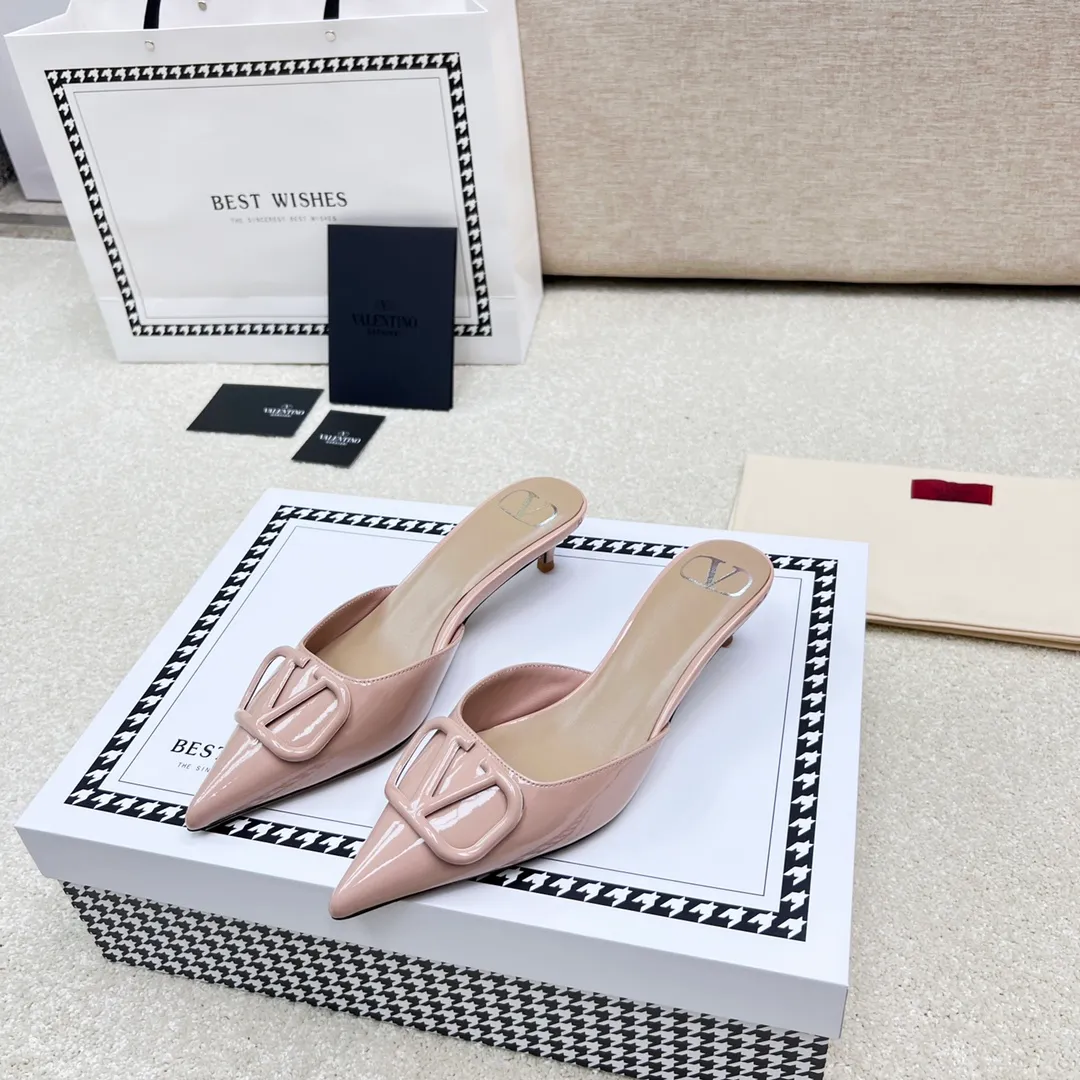 💕💕Factory direct selling price p500💕💕 VALENTINO latest V Logo buckle back empty slippers🔥🔥🔥 🕳️🕳️🕳️ Exclusive original 1-1 development, no goods without the original 〰 ɪɴлᴏʀᴍᴀᴛɪᴏɴ 〰 Buckle: V-LoGo leather buckle Material: imported patent leather Lining: full-grain sheepskin Outsole: Italian dyed cowhide Midsole: Italian original craft material Process: computer stitching, machine shaping Heel height: 4.0/8cm Made in Italy 🇮🇹 Ready stock code: 35 36 37 38 39 Ready stock Customized code: 34 40 41 Shipping time is 1-3 days, non-refundable